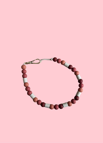Collier en perles de céramique anti-parasites